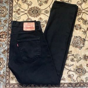 LEVI’s 501 black jeans.